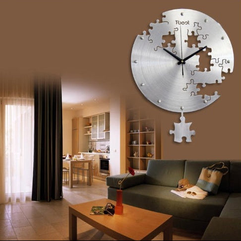 Orologio da parete circolare 16'' in metallo con pezzi puzzle, design moderno silenzioso per soggiorno o camera.