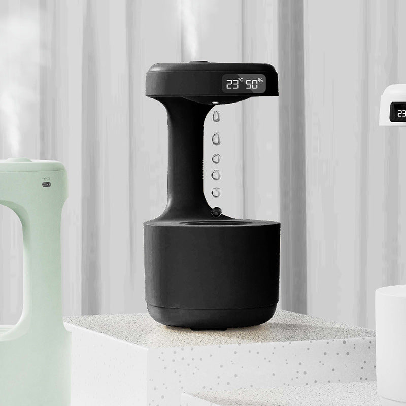 Umidificatore anti-gravità con orologio digitale e diffusore d'aroma, grande capacità e funzionamento silenzioso.