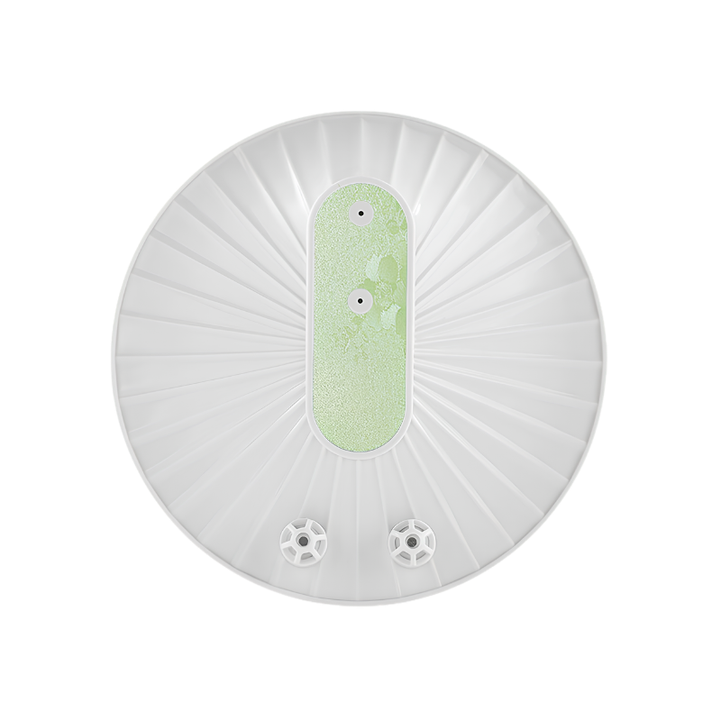 Dispositivo portatile rotondo USB per lavaggio di frutta e verdura, superficie con pad verde centrale e due fori.