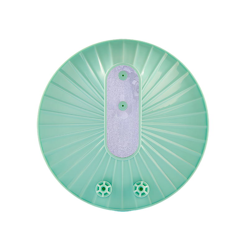 Dispositivo portatile USB per lavaggio di frutta e verdura, disco verde con piastra centrale e ugelli.