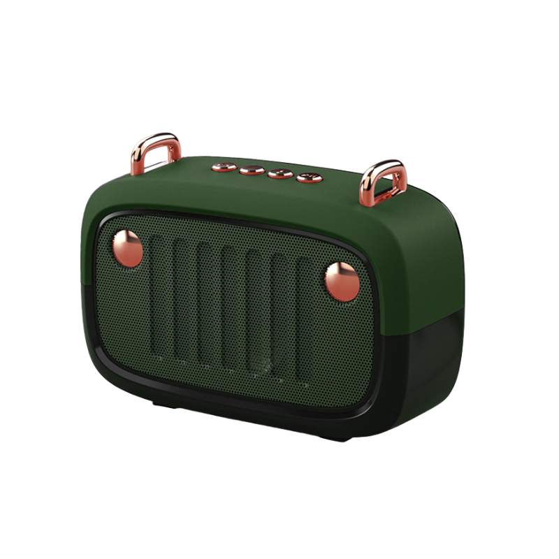 Altoparlante portatile Bluetooth verde con design retro, subwoofer cartoon, FM radio e dettagli in metallo rosa oro.
