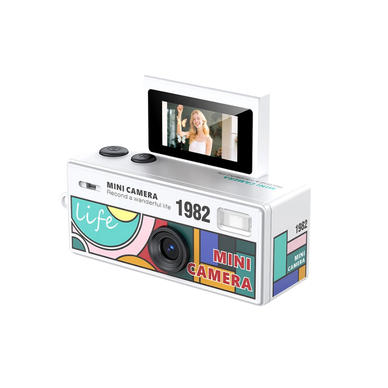 Mini videocamera retro HD con schermo ribaltabile 0.96", design colorato "1982" e supporto per memory card.