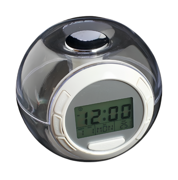 Sveglia circolare colorata con cupola trasparente, display digitale, 10.5×9.5×8.2 cm, tre AAA, suoni naturali, immagine principale.