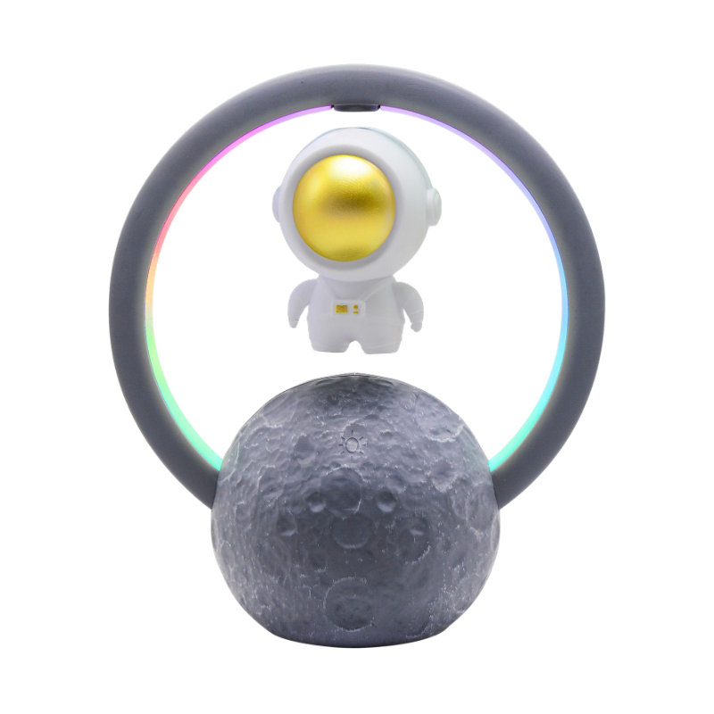 Altoparlante Bluetooth levitante con astronauta e anello LED su base lunare.