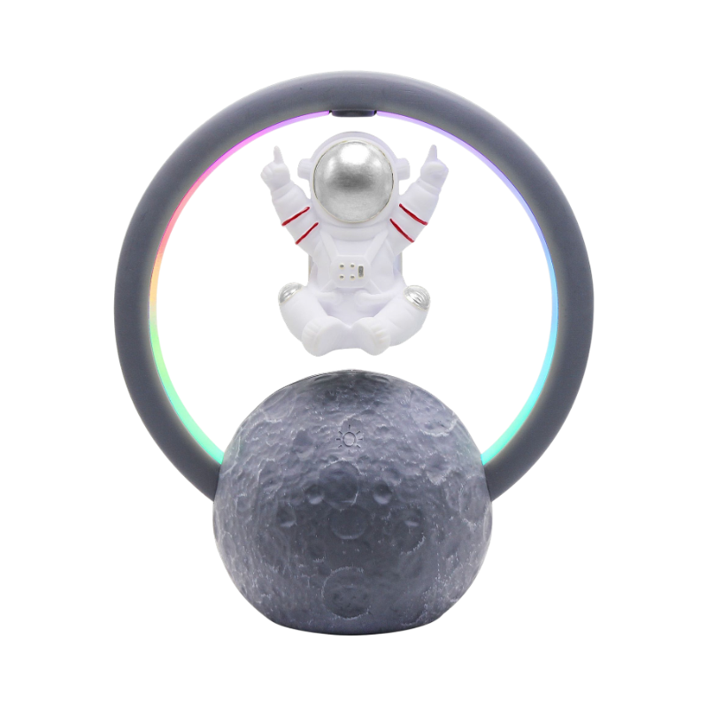 Altoparlante Bluetooth a levitazione con astronauta bianco sopra luna, cerchio LED multicolore