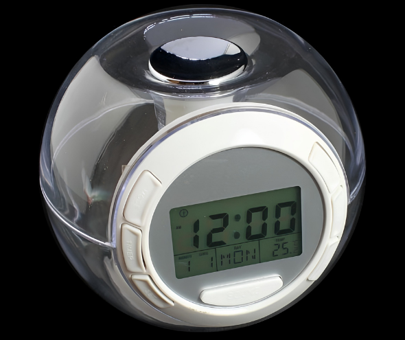 Sveglia circolare colorata con cupola trasparente, display digitale, 10.5×9.5×8.2 cm, tre AAA, suoni naturali.