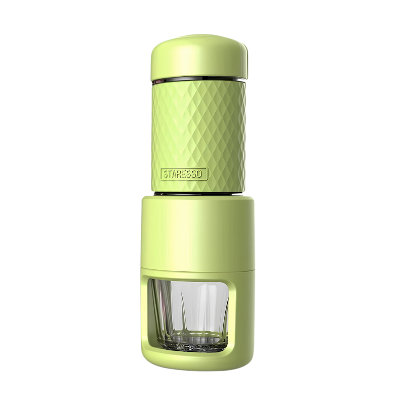 Macchina manuale espresso portatile verde lime con finitura romboide, design silenzioso e portabicchiere integrato.