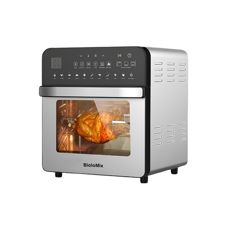Forno a convezione in acciaio inoxBioloMix con rotisserie, capacità 15L e potenza 1700W, mentre cuoce un pollo intero.