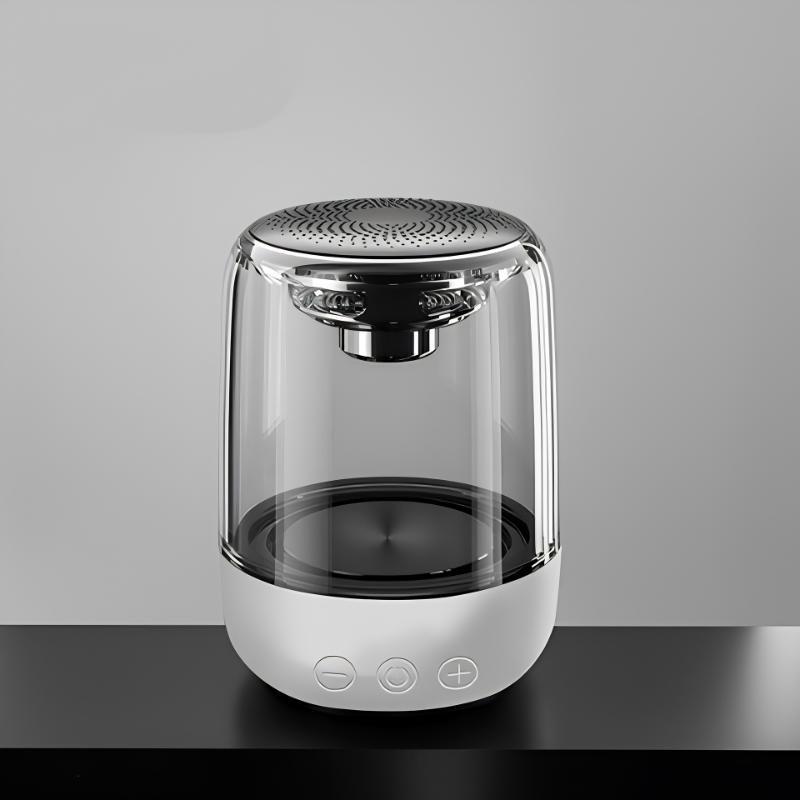 Altoparlante Bluetooth portatile a colonna, corpo trasparente e base bianca, luci LED colorate variabili.