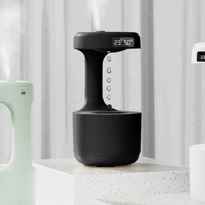 Umidificatore anti-gravità con orologio digitale e diffusore d'aroma, grande capacità e funzionamento silenzioso.