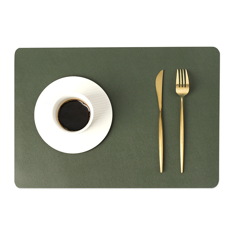 Sottopiatto in ecopelle tinta unica verde oliva, impermeabile e resistente agli oli, ideale per casa o hotel.