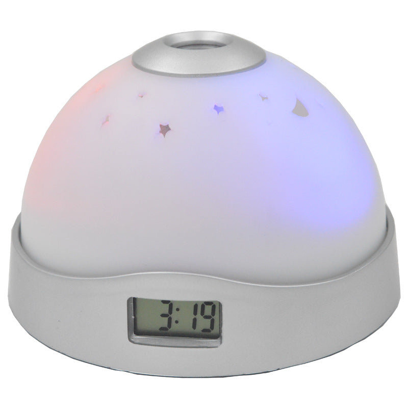 Sveglia proiettore con luce notturna a cupola stellata, base grigia e display 3:19, 86x97x64 mm, AAA non inclusa.