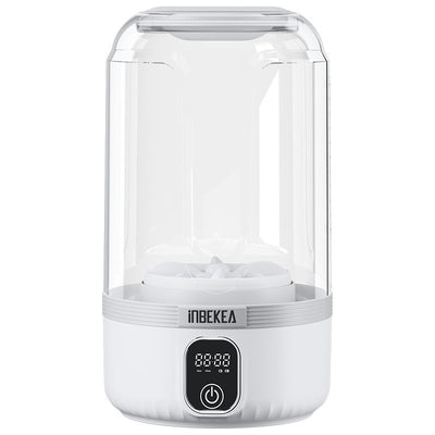 Lavatrice mini portatile wireless automatica, alimentata USB, corpo bianco e contenitore trasparente con display.