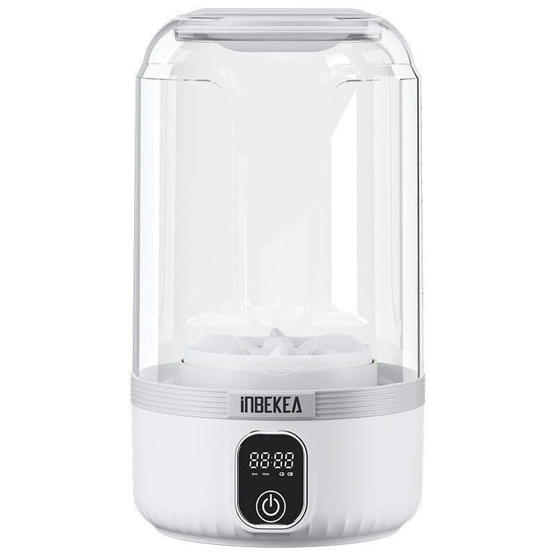 Lavatrice mini portatile wireless automatica, alimentata USB, corpo bianco e contenitore trasparente con display.