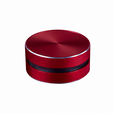 Mini Speake a conduzione ossea rosso. Trasforma oggetti  in audio Bluetooth TWS wireless compatto e versatile.