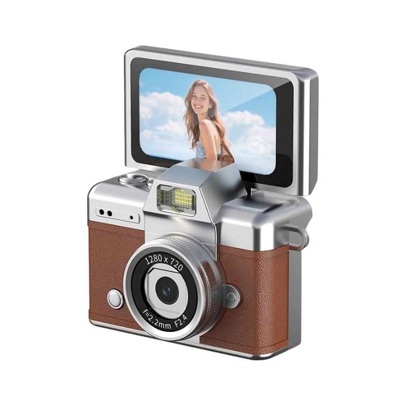 Camera digitale compatta retrò con schermo ribaltabile HD, finitura argento e marrone, design vintage e controllo manuale.