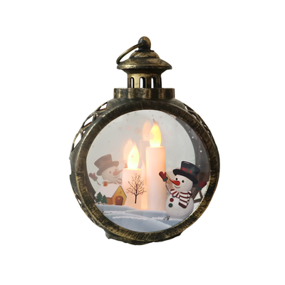 Lanterna rotonda in bronzo con decorazione natalizia, pupazzo di neve e candele LED illuminate.