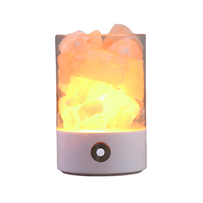 Lampada USB sale cristallina con luce LED calda. Genera ioni negative purificando l'aria e assorbendo l'umidità. Base con pulsante.