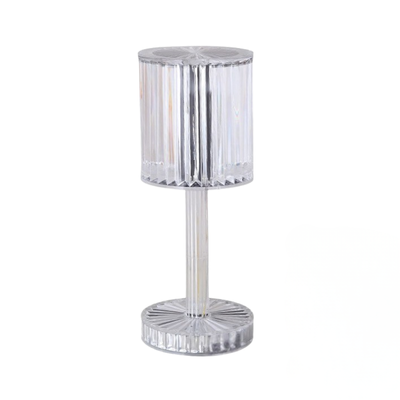 Lampada LED effetto cristallo con paralume trasparente e base sagomata, touch dimmerabile a 3 intensità per luce calda e atmosfera romantica.